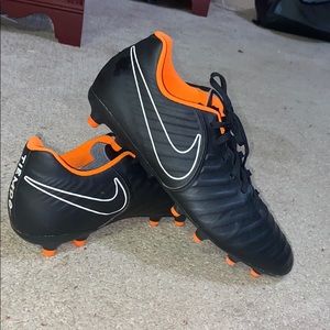Black and orange Nike Soccer cleats